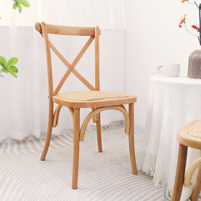 Chaise de salle à manger en rotin à dos professionnel empilable X en bois d'accent français Chaise de mariage en bois en couleurs personnalisées