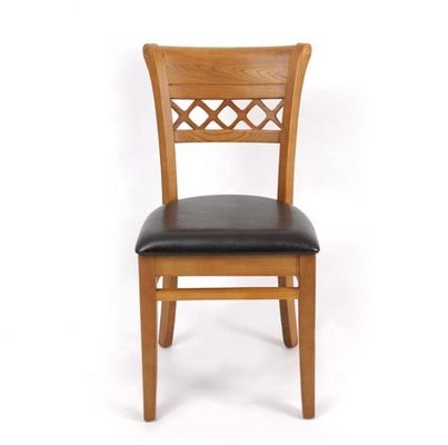 Chaise à manger en bois massif avec un design moderne et un coussin rembourré en cuir PU doux
