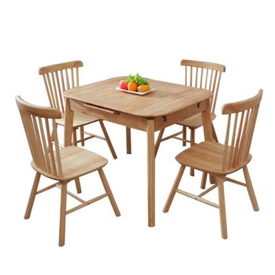 Table à manger en bois massif nordique et combinaison de chaises pour une salle à manger simple, moderne et écologique