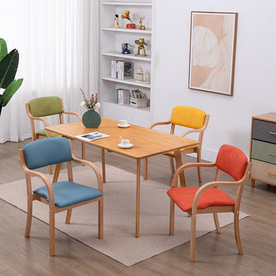 Chaise de salle à manger en bois de luxe en tissu en cuir en PU de style français Salle à manger courbée Chaise à manger en bois pour maisons modernes