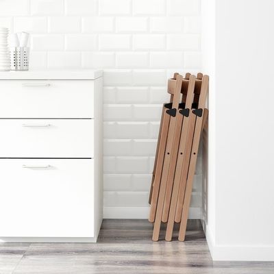 Chaises pliantes en bois de finition nitrolacquer moderne pour l'hôtellerie et les événements en 2023