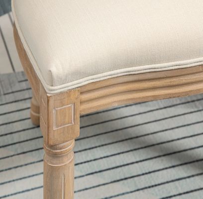 Chaise de salle à manger couverte en cuir en PU de style vintage français avec conception empilable et bois massif