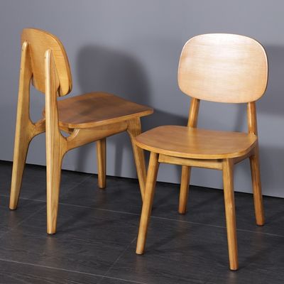 Chaise de restaurant nordique en bois de caoutchouc Chaises en bois exquises pour salle à manger moderne