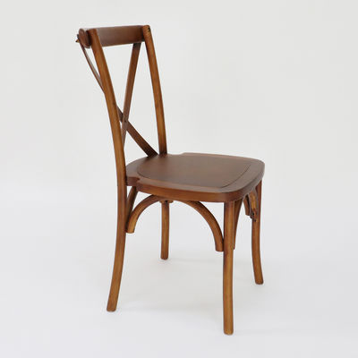 Meubles commerciaux empilés Croix X vintage arrière Chaises à manger en bois pour les mariages Événements et restaurants