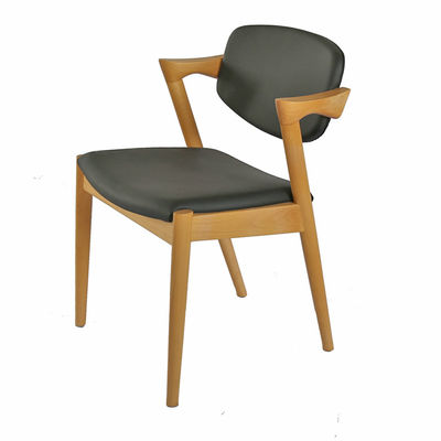 Chaise de salle à manger en cuir en PU en bois pour café d'hôtel polyvalente et fonctionnelle