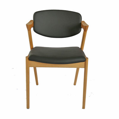 Chaise de salle à manger en cuir en PU en bois pour café d'hôtel polyvalente et fonctionnelle