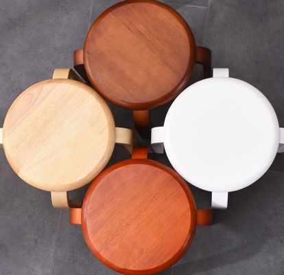 Service OEM Accepté Mode Tabouret simple Maison moderne Petit tabouret rond en bois massif Chaises empilables Tabouret en bois Tabouret en bois incurvé