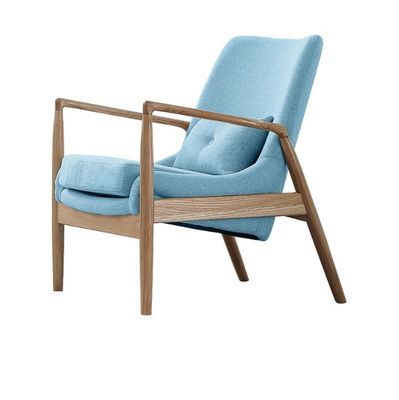 Créez un espace de vie confortable et élégant avec ce fauteuil roulant en cuir de style nordique moderne