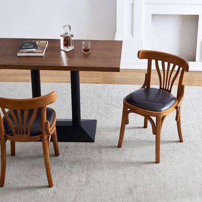 Chaise de salle à manger en bois sans bras avec couverture en cuir en PU et structure en bois