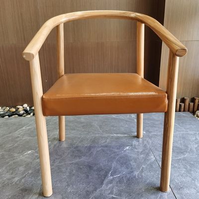 Chaise à manger en cuir en bois massif en PU en Europe du Nord pour restaurant